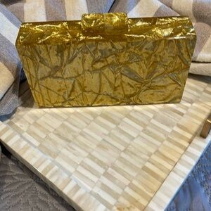 Gold hard side clutch (bw)